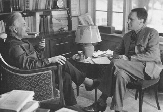 Albert Einstein converses with Leopold Infeld.jpg