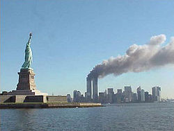 9-11_Statue_of_Liberty_and_WTC_fire.jpg